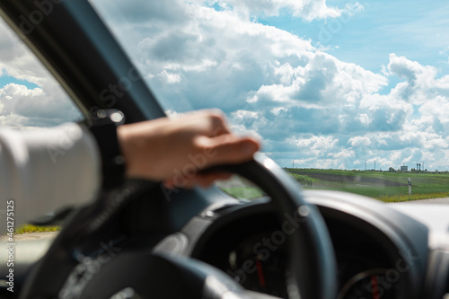 Wallpaper Mural man hands on steering wheel cloudy sunny day Torontodigital.ca
