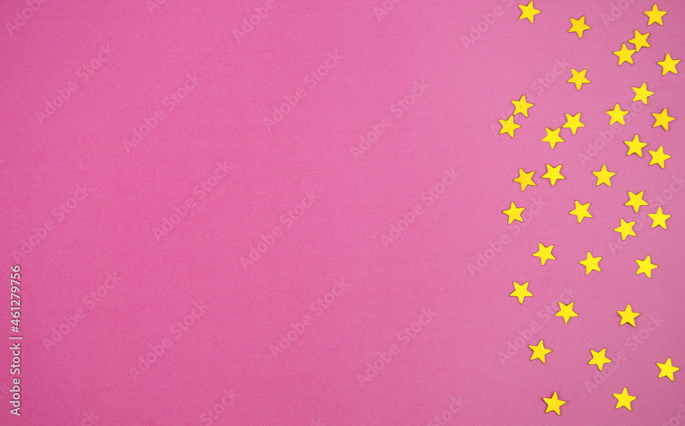 Pink background with golden stars. A place for your text. Holiday concept. Flat lay Pink background with golden stars. A place for your text. Holiday concept. Flat lay