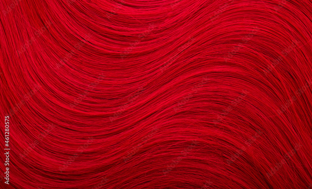 Red hair. Background hair closeup. Female long red-haired close-up as a background. Beautifully laid carroty wavy shiny curls. Hair coloring.Hairdressing procedures. Copy space with space for text. Red hair. Background hair closeup. Female long red-haired close-up as a background. Beautifully laid carroty wavy shiny curls. Hair coloring.Hairdressing procedures. Copy space with space for text.