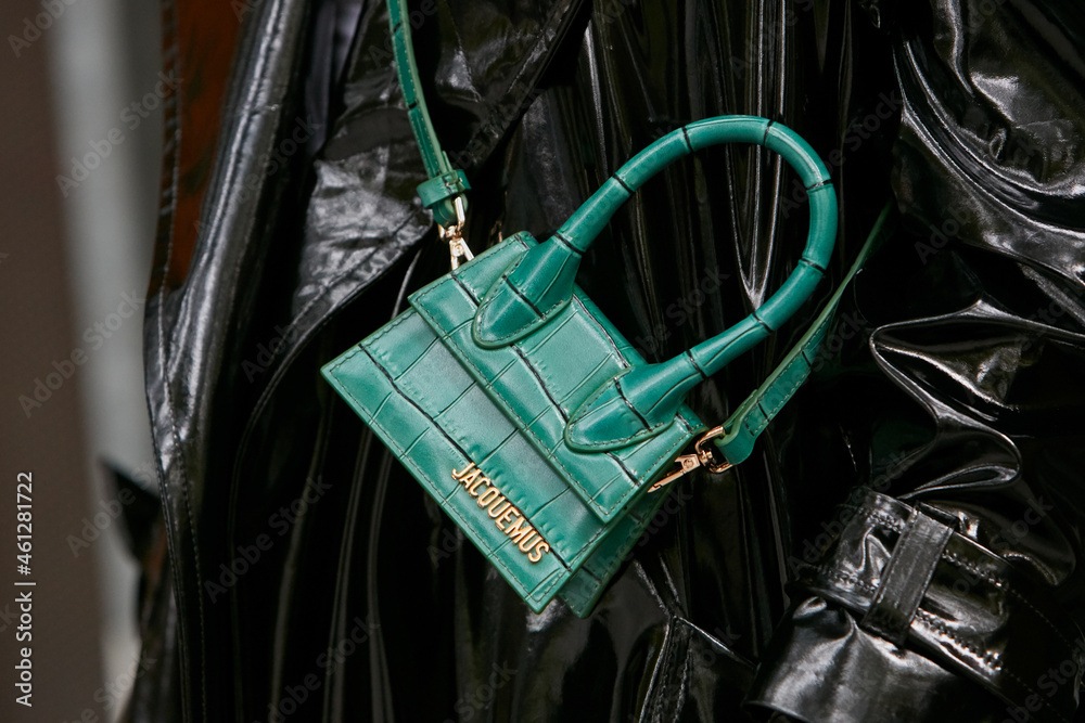 Woman with green crocodile leather Jacquemus bag and black shiny jacket on  September 19, 2019 in Milan, Italy Stock Photo | Adobe Stock