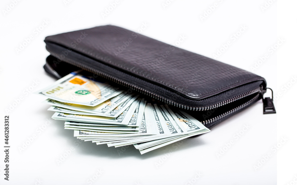 Wallet with money. US dollars close up. Cash in a man's wallet isolated on white background. Financial well-being. Good cash income, wages. Wealthy person. Wallet with money. US dollars close up. Cash in a man's wallet isolated on white background. Financial well-being. Good cash income, wages. Wealthy person.