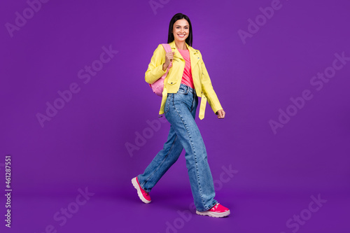 Full body profile side photo of young lovely girl go college education backpack isolated over violet color background