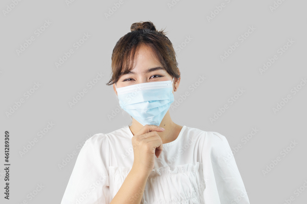 Asian women wearing masks to protect themselves from COVID-19