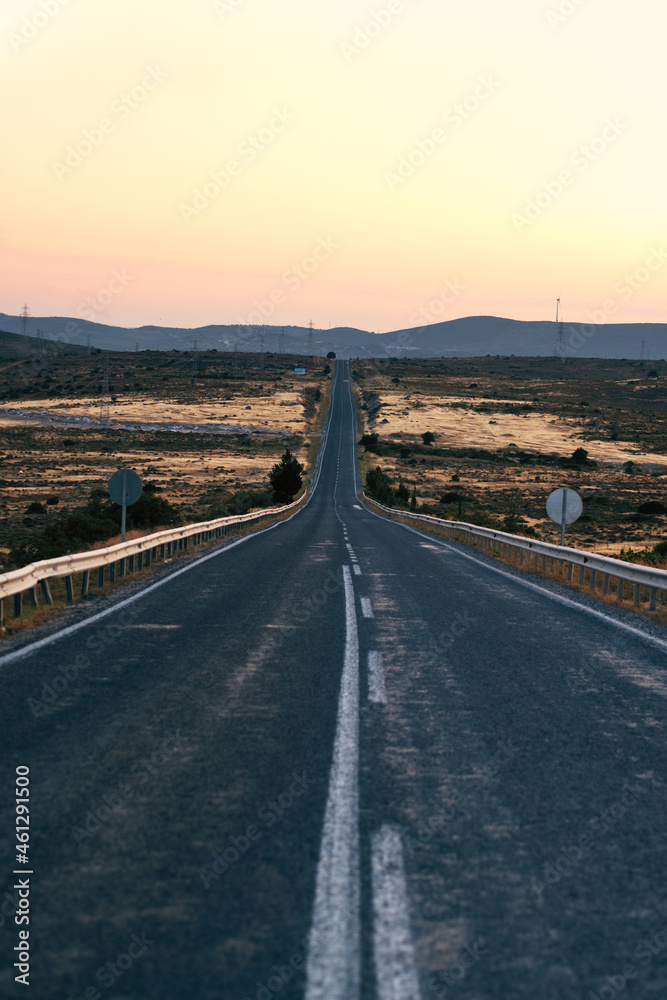Empty straight country road background in the evening Empty straight country road background in the evening