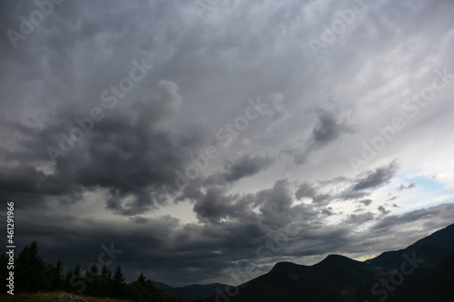 Fototapeta Naklejka Na Ścianę i Meble -  Picturesque view of cloudy sky over majestic mountain landscape