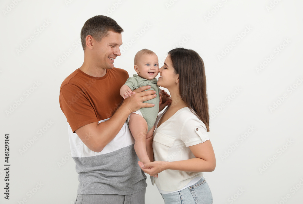 Portrait of happy family with their cute baby on white background Portrait of happy family with their cute baby on white background