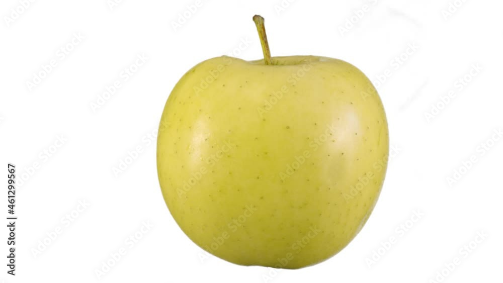 Ripe yellow apple on a white isolated background rotates. Minimalistic animated design style. Elements concept blank background template. The art of minimal motion design. Ripe yellow apple on a white isolated background rotates. Minimalistic animated design style. Elements concept blank background template. The art of minimal motion design.