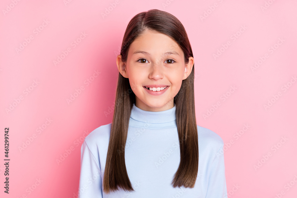 Portrait of attractive cheerful cute content girl wearing blue pullover isolated over pink pastel color background Portrait of attractive cheerful cute content girl wearing blue pullover isolated over pink pastel color background