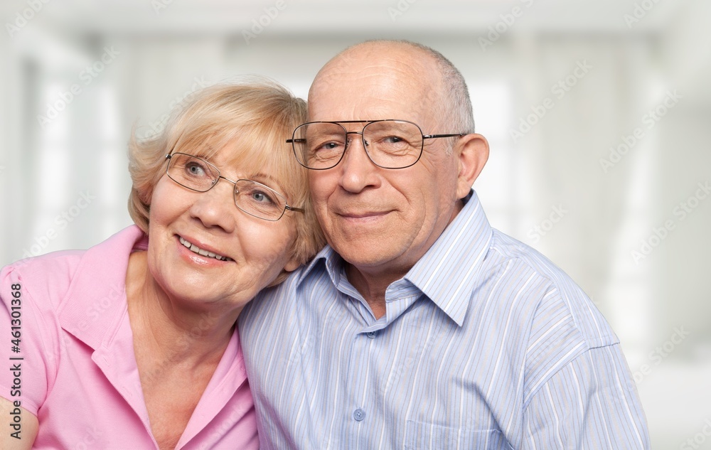 Happy older mature classy couple hugging, thinking of good future. Happy older mature classy couple hugging, thinking of good future.