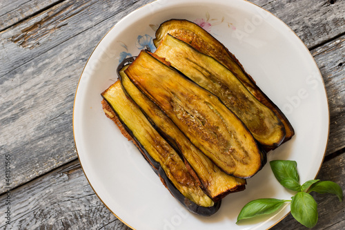 Traditional country stuffed eggplants with egg, cheese, garlic, parsley and oregano filling