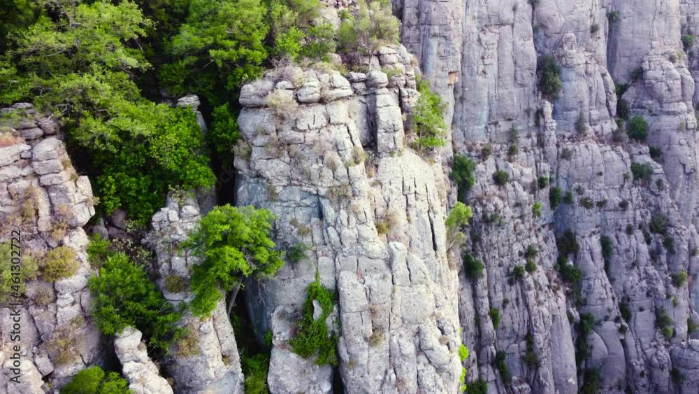 Huge Spectacular Rocks, epic aerial drone flight over famous Mountains Valley, Huge stone structures, Dramatic geological wonder with green Trees. Birds eye view landscape 4k Huge Spectacular Rocks, epic aerial drone flight over famous Mountains Valley, Huge stone structures, Dramatic geological wonder with green Trees. Birds eye view landscape 4k