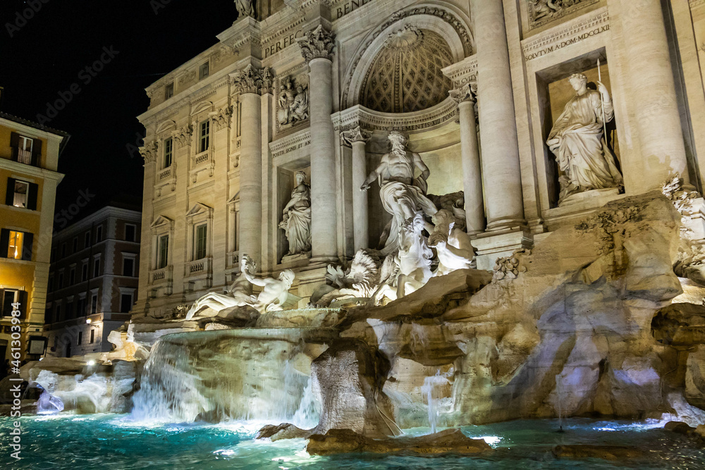 Details of Trevi fountain in Rome, Italy at night.