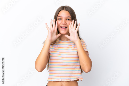 Little caucasian girl isolated on white background shouting and announcing something