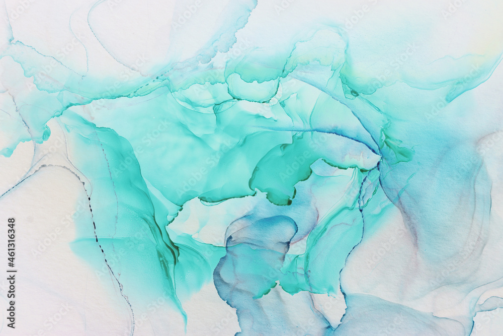 Fototapeta premium art photography of abstract fluid alcohol ink painting, blue and turquoise colors with paper texture