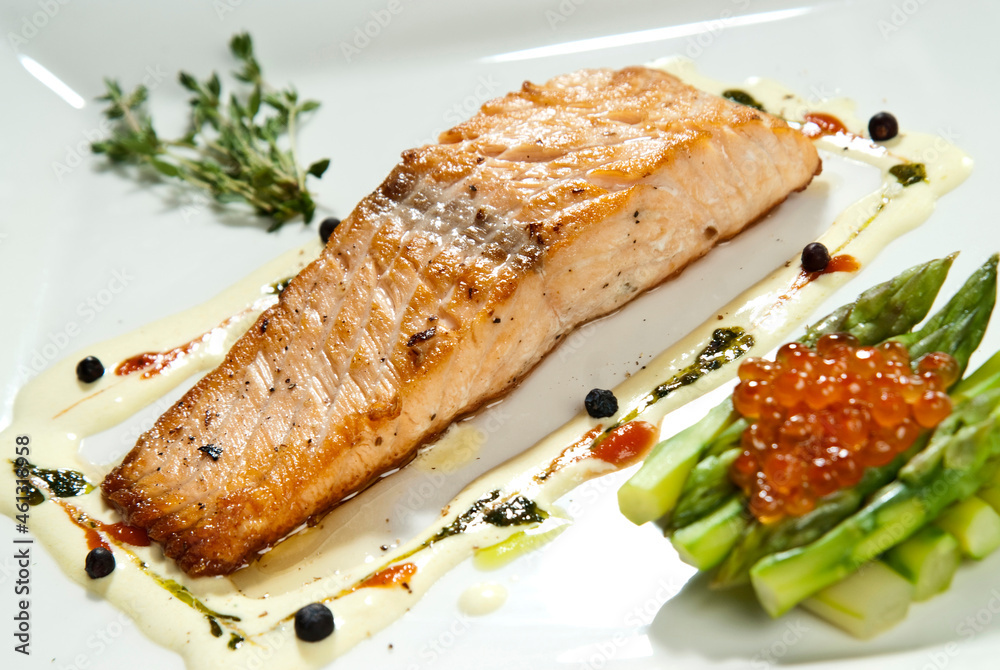 Baked salmon steak with stir-fry veggies