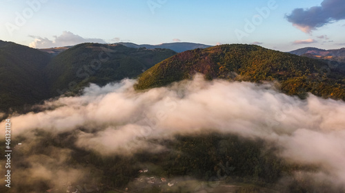 Clouds on Mountain Peak Aerial View