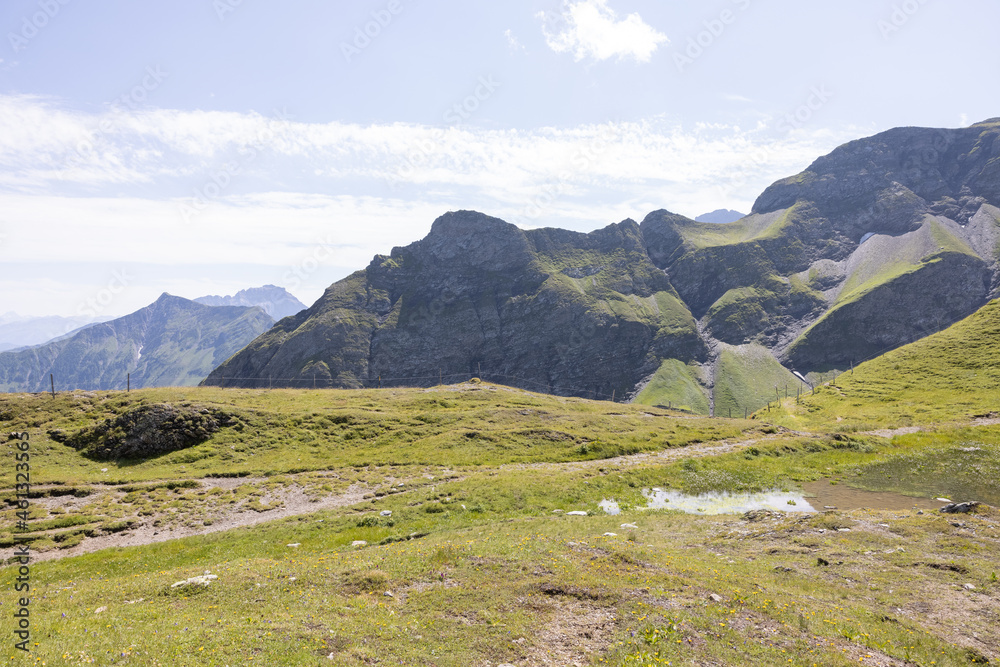 Fototapeta premium Amazing hiking day in one of the most beautiful area in Switzerland called Pizol in the canton of Saint Gallen. What a wonderful landscape in Switzerland at a sunny day.