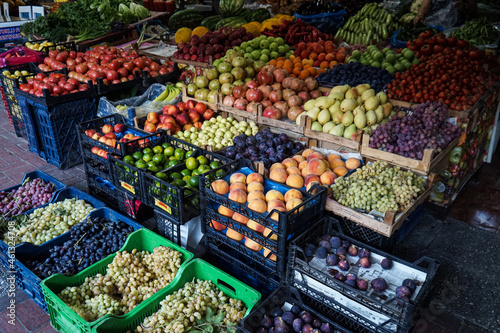 Sale of fresh fruits and vegetables at the market.             