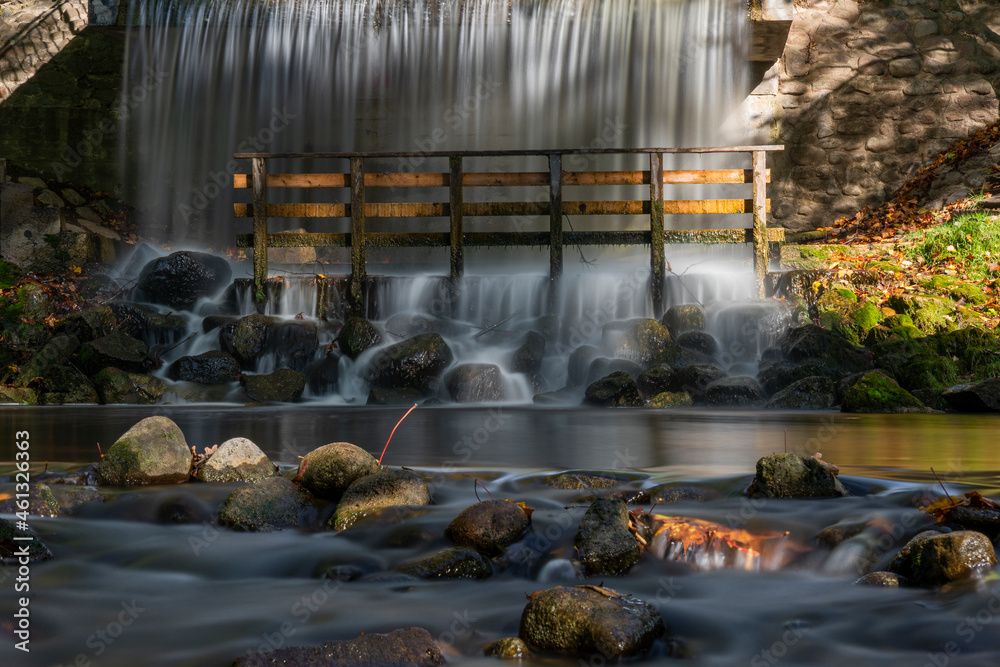 Fototapeta premium City Smiltene, Latvia. The waterfall flows into the Abula River, which flows through the Old Park.