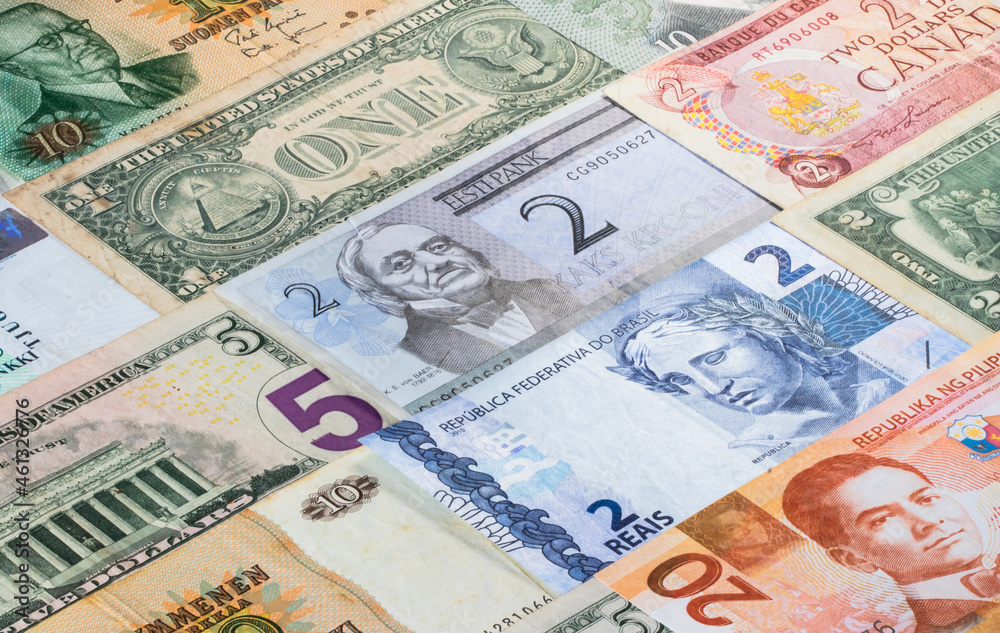 Colorful background with current and old banknotes from some countries. Colorful background with current and old banknotes from some countries.
