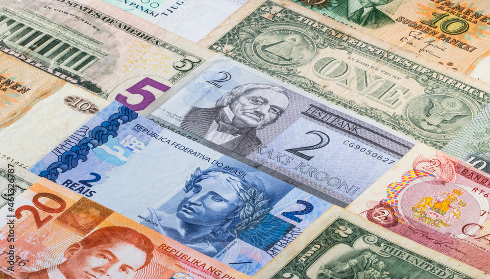 Colorful background with current and old banknotes from some countries. Colorful background with current and old banknotes from some countries.