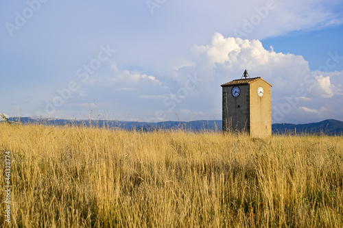 Horizontal shot of a clock tower in Comarca Matarrania, Teruel province, Spain photo
