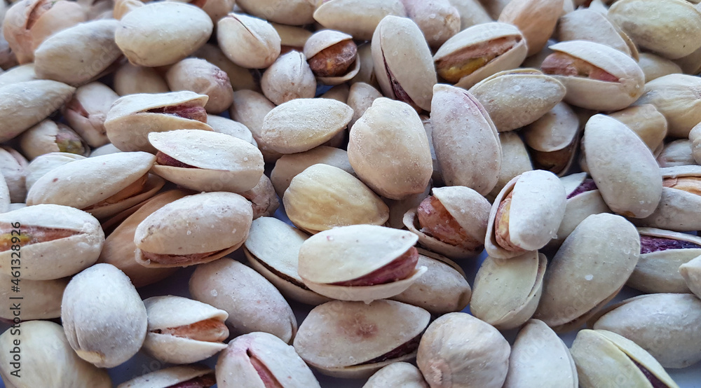 Pistachios texture and background . Tasty pistachios as background,as pistachios texture. flat lay