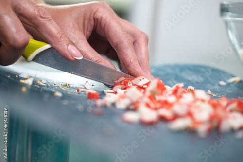 cooking crab salad with corn in the kitchen