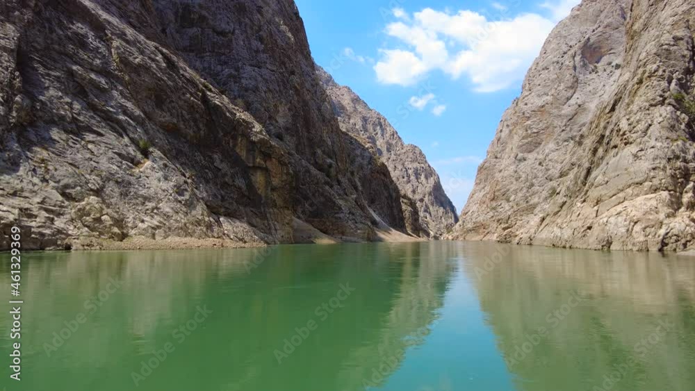 Huge steep cliffs canyon in the Euphrates River delta, Dramatic geological wonder in Turkey. Beautiful background and unusual landscape, 4k gimbal shoot