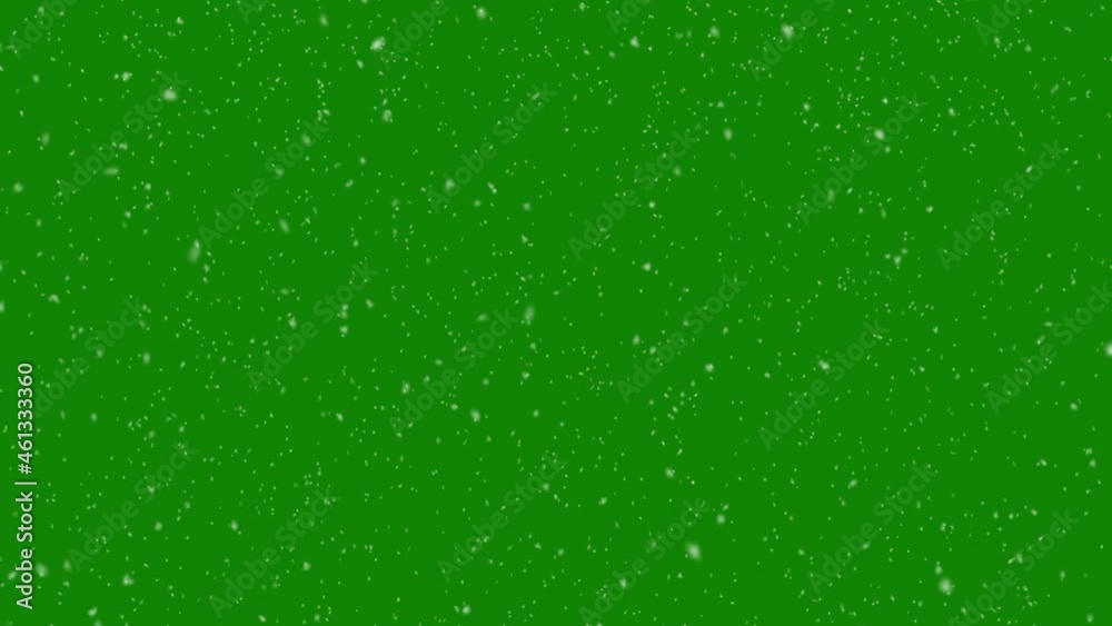 Isolated falling snow on green screen, seamless loop