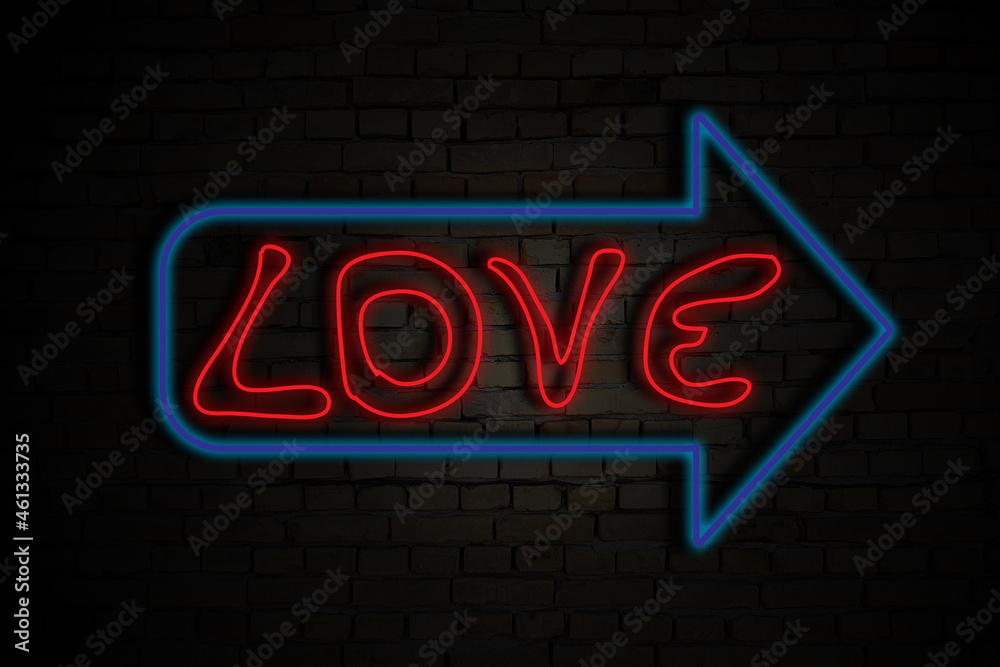 Neon sign with an arrow, the way to the love, background of bricks in the dark Neon sign with an arrow, the way to the love, background of bricks in the dark