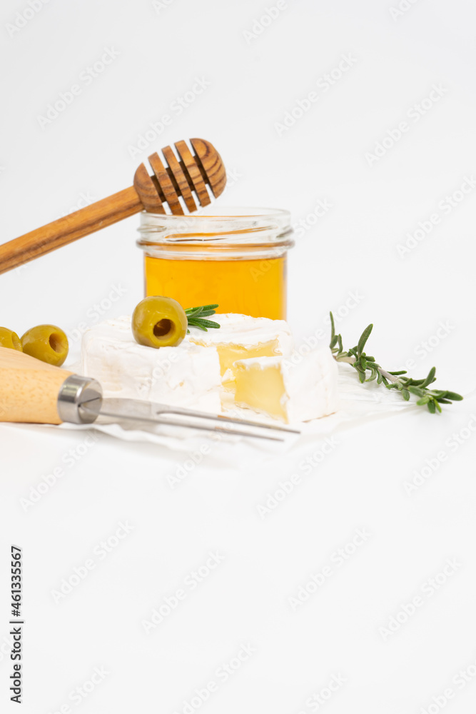 Round brie or camambert cheese on a white background Round brie or camambert cheese on a white background