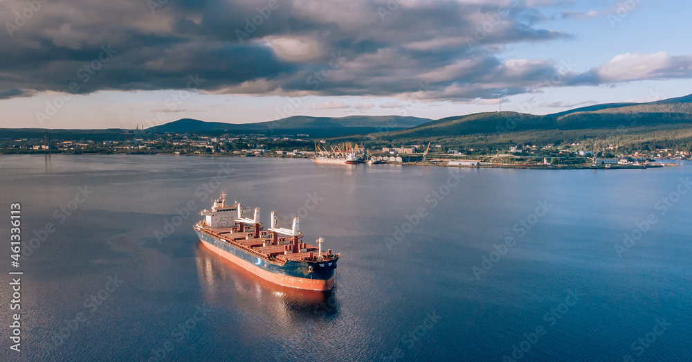 Large cargo ship in the White sea aerial view.