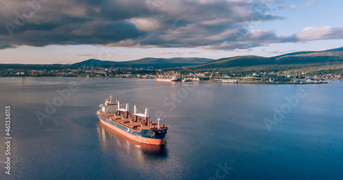 Large cargo ship in the White sea aerial view.