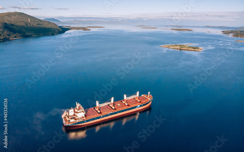 Large cargo ship in the White sea aerial view.