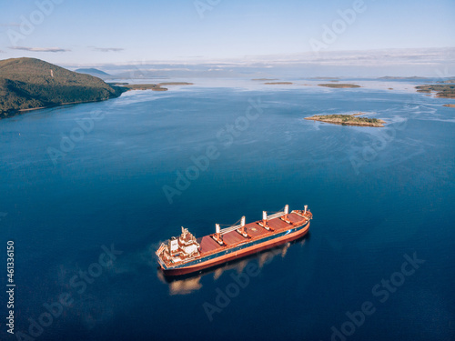 Large cargo ship in the White sea aerial view.