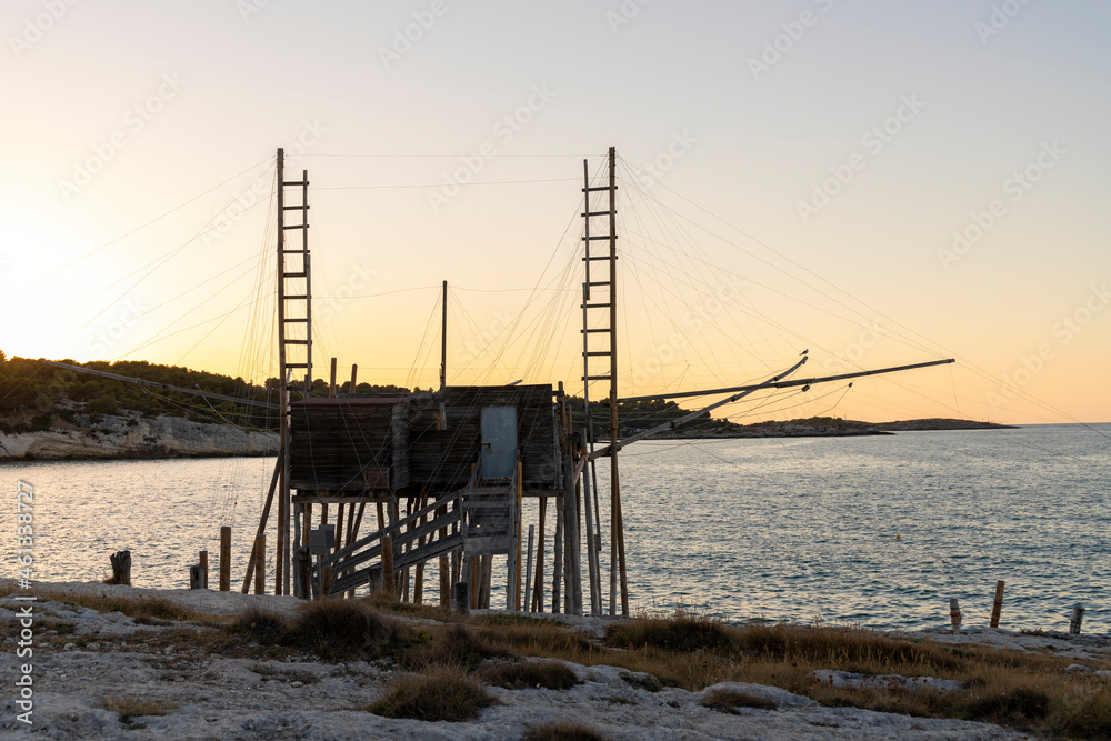 Trabucco for fishing on the Gargano at sunset, Puglia, Italy. Trabucco for fishing on the Gargano at sunset, Puglia, Italy.