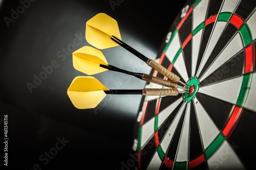 Closeup of Darts in Bullseye