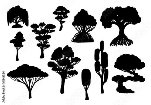 Set of hand-drawn black tree silhouettes. Isolated vector doodles.