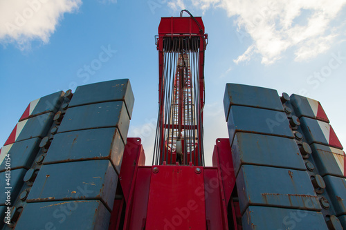 Tablou pe pânză Rear view of crawler crane counterweights, closeup.