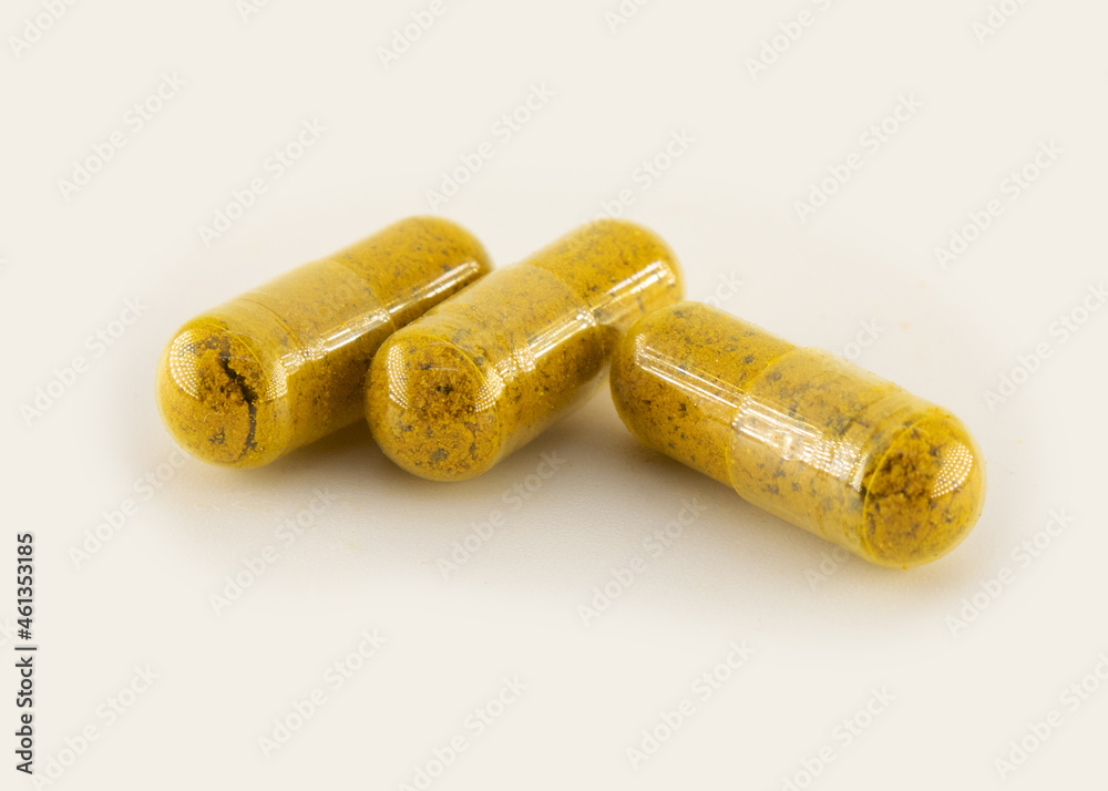 CBD hemp capsules isolated on white background. CBD hemp capsules isolated on white background.