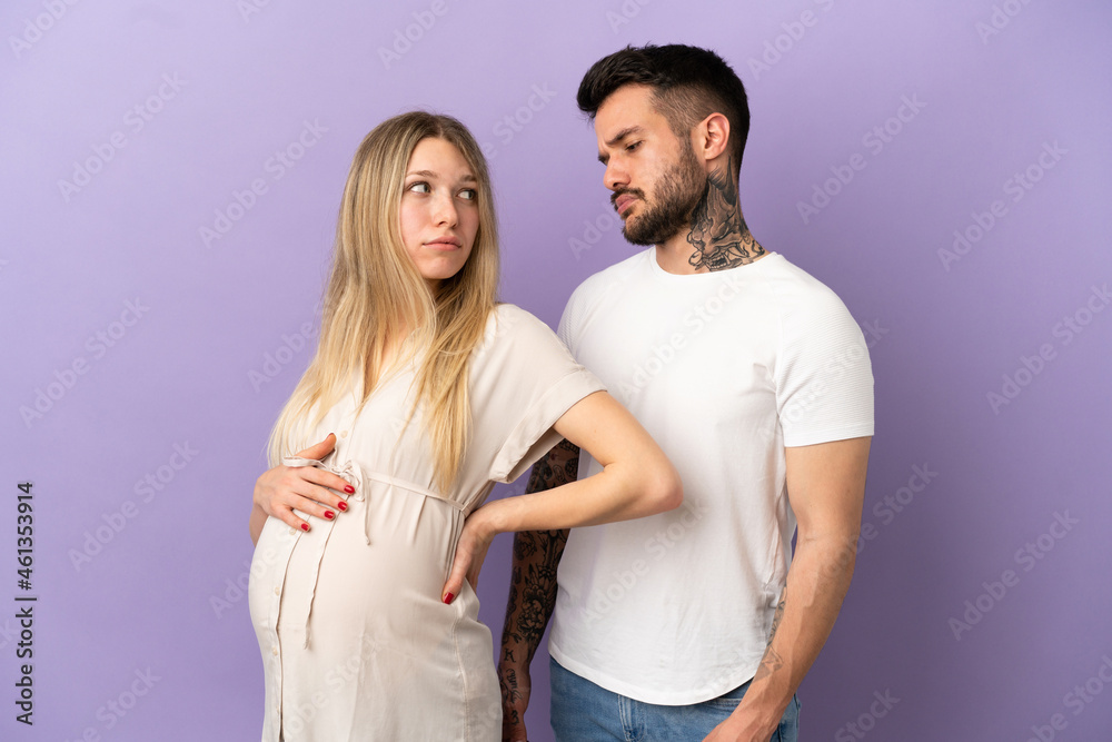 Fototapeta premium Young couple pregnant
