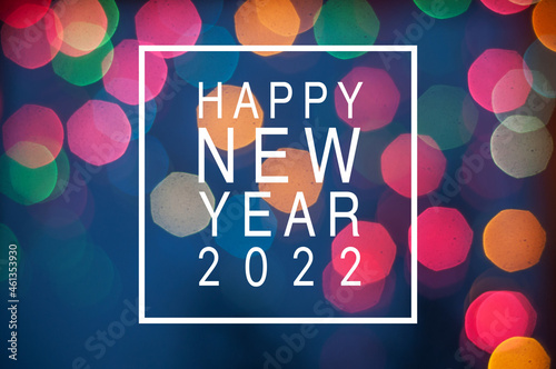 Christmas holiday festive glittering defocused colorful background with bokeh lights