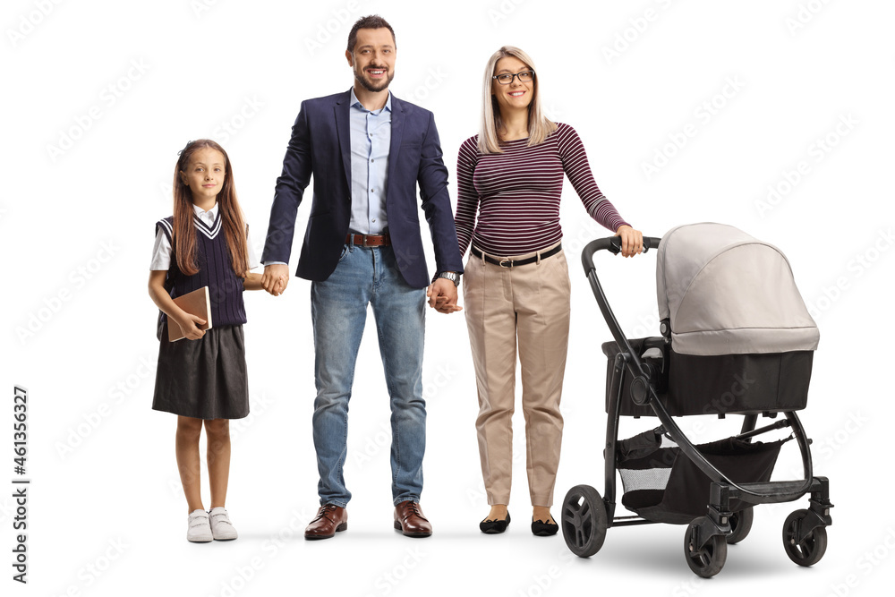 Full length portrait of a family with a baby stroller and a schoolgirl Full length portrait of a family with a baby stroller and a schoolgirl