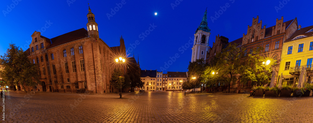 Torun. Old market square and town hall at sunrise.