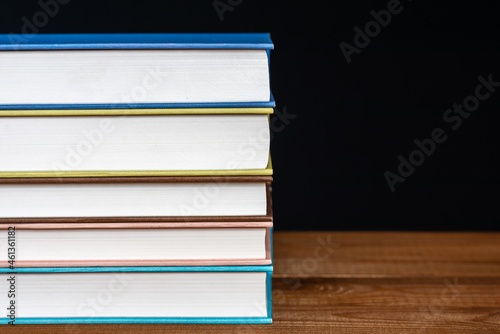 Old colorful books isolated on white background