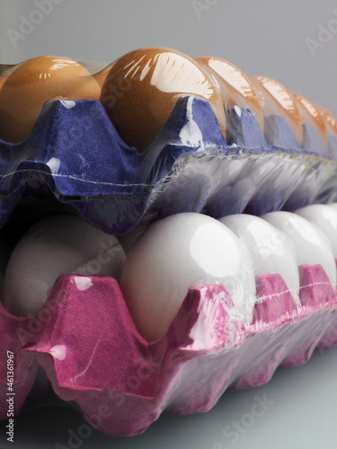 Trays of eggs shrink wrapped and stacked photo