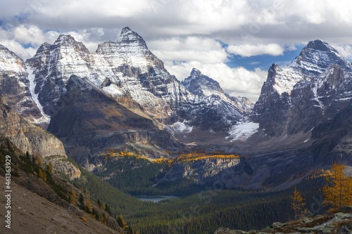 Lake O   Hara Alpine Basin Aerial View with Snow Covered Rocky Mountain Peaks of Continental Divide on Skyline.  Scenic Autumn Landscape in British Columbia Yoho National Park