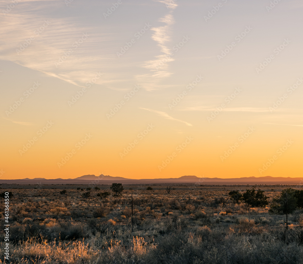 orange sunset sky and mountains