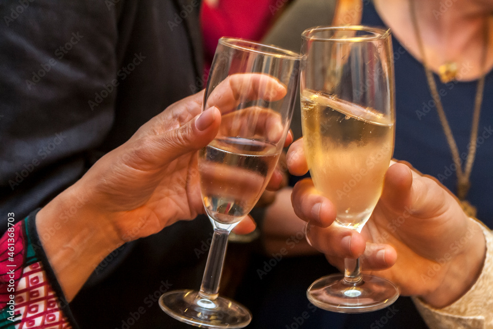 Close-up of glasses of sparkling wine making a toast and a party in Brazil. Celebration concept